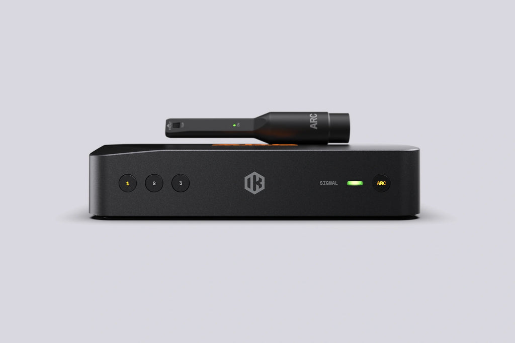 IK Multimedia ARC Studio+ room correction unit with ARC measurement microphone, front view