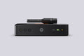 IK Multimedia ARC Studio+ room correction unit with ARC measurement microphone, front view