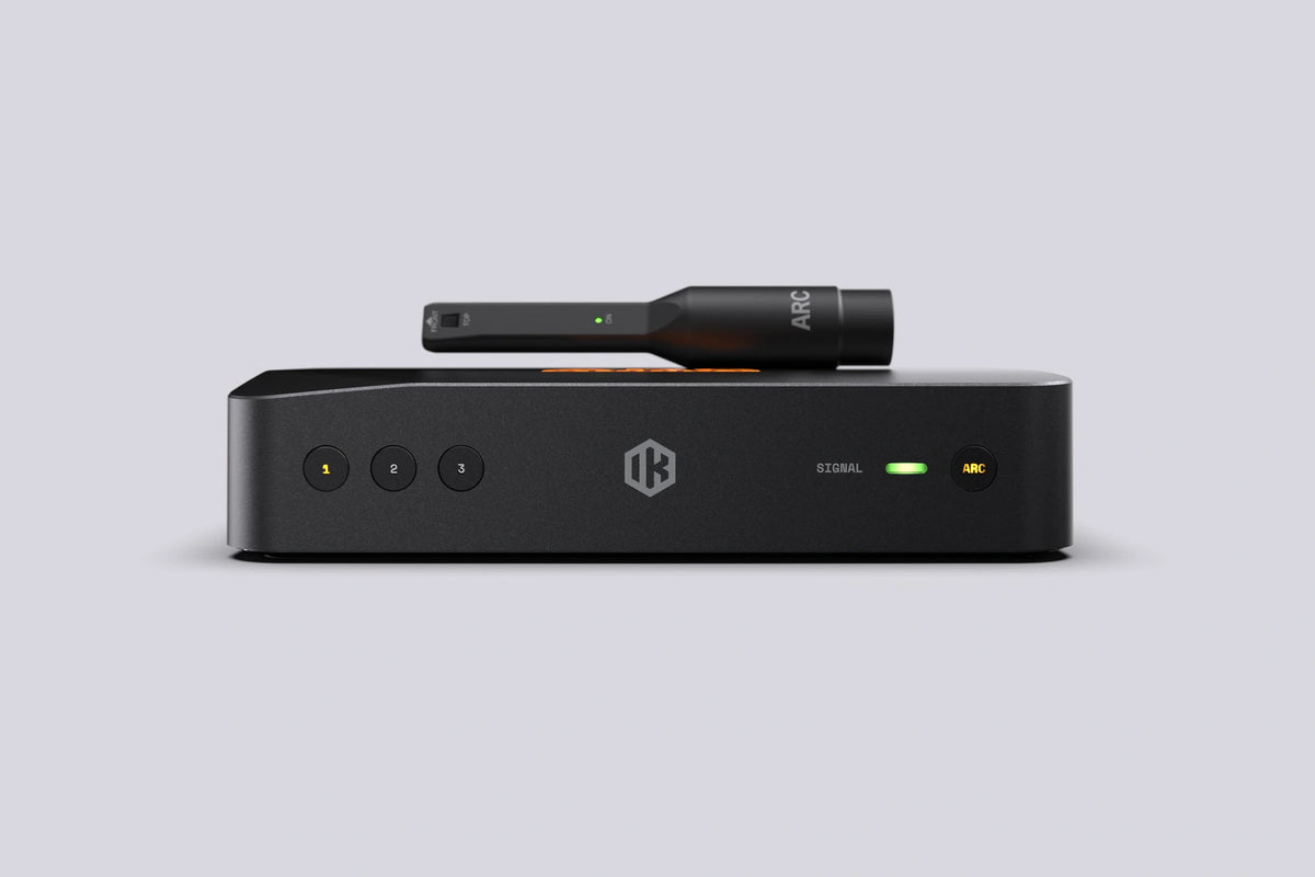 IK Multimedia ARC Studio+ room correction unit with ARC measurement microphone, front view