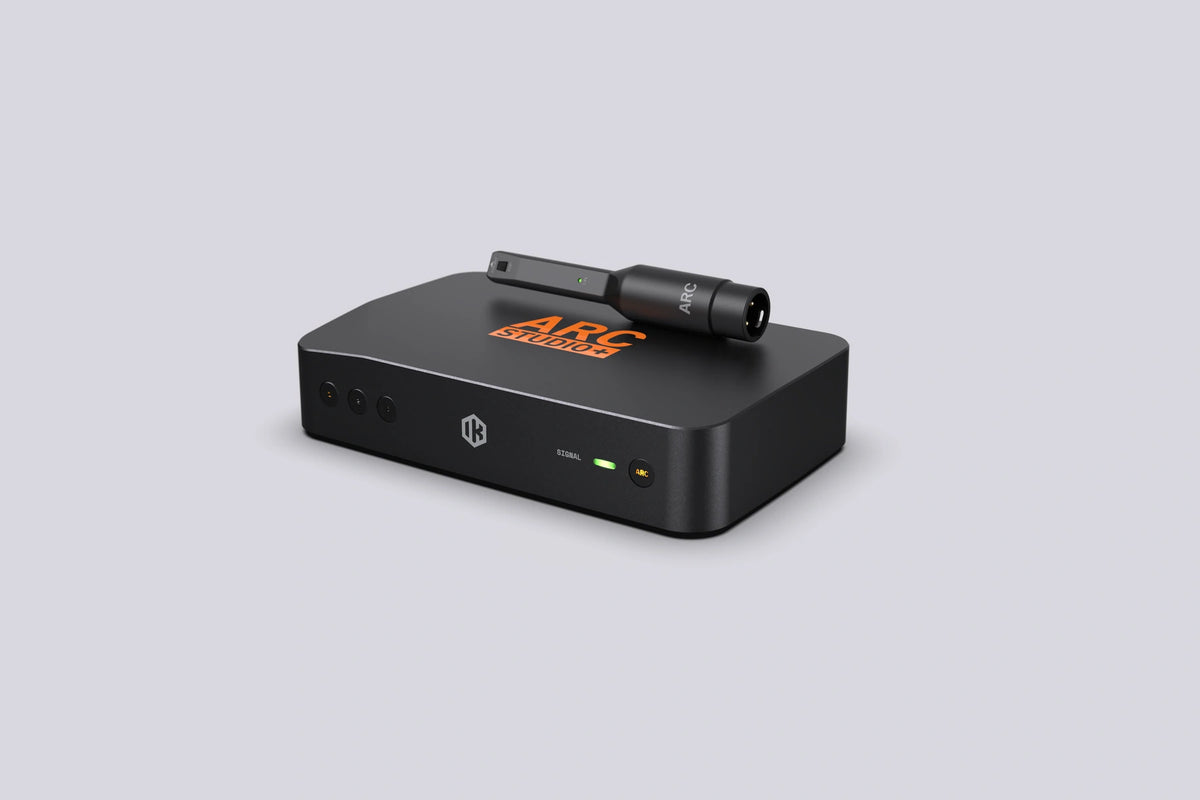 IK Multimedia ARC Studio+ room correction unit with measurement microphone, angled front view